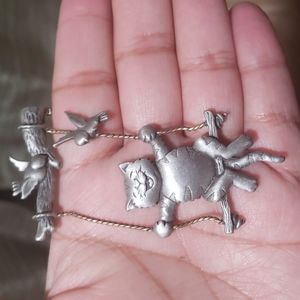 Vintage 1980's swinging cat pin